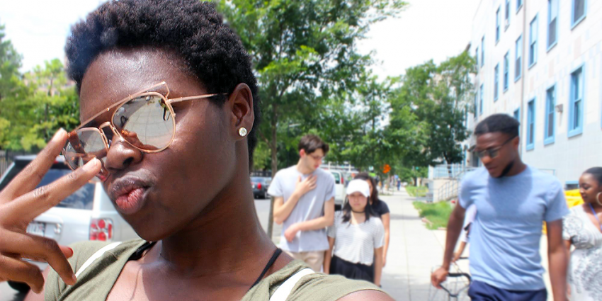 Even while delivering meals for the homeless, Heaven Taylor-Wynn still can make time for a selfie. STIPDG student takes a selfie